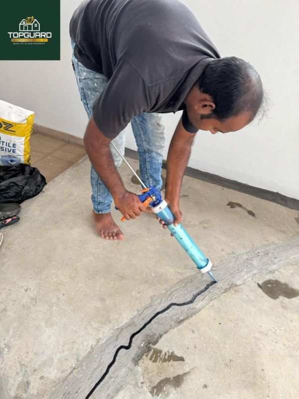 Putting acrylic waterproofing coating on cracked balcony floors