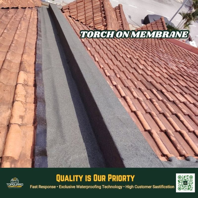 TopGuard torch on membrane roof repair in Petaling Jaya