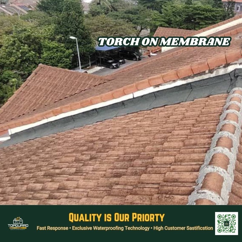 Using torch on membrane for roof repair on a residential home in Puchong